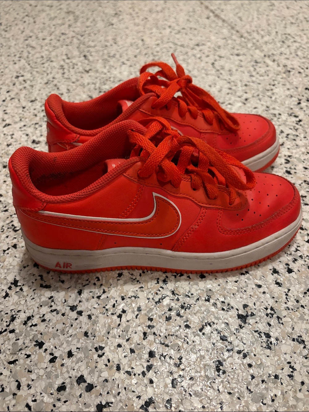 Nike Bright Red Kids Low-Top Sneakers with White Swoosh